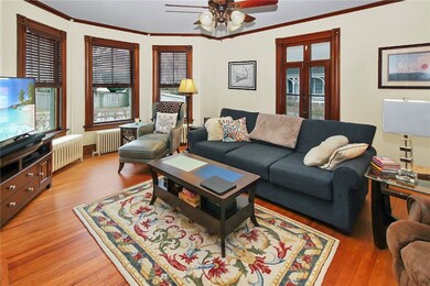 Spacious Living Room has gas fireplace and bay win