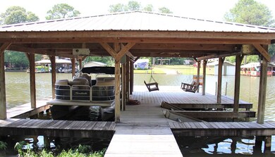 Double Slip Boathouse with Boat Slip