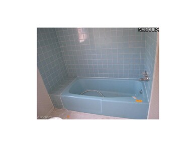 Bathtub and surround