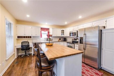 The kitchen sports stainless steel appliances Ref.