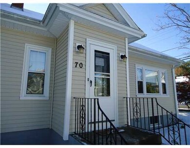 Exterior Front. MAIN ENTRACE HAS LARGE COAT CLOSET