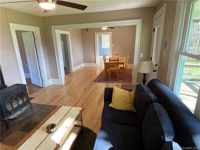 Living room looking to dining room.  Jotul wood st