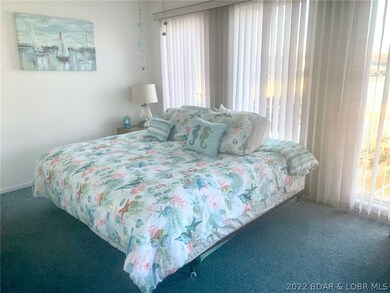 King size bed in Master. lots of windows