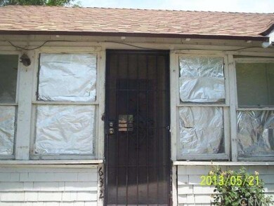 FRONT DOOR.FOIL IN THE WINDOWS