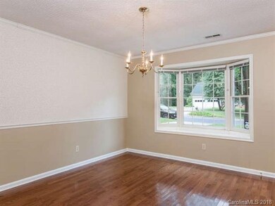 Dining room just off kitchen with lovely bay windo