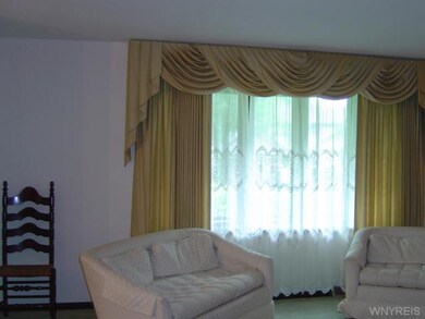 Living Room Living Room  19 x 14 has a bow window 