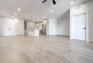 Unfurnished living room featuring recessed lighti
