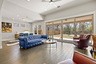 Living area featuring ceiling fan, recessed light