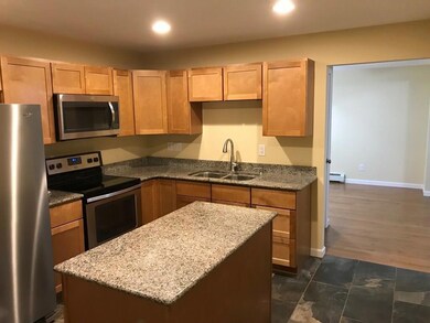 A brand new kitchen with granite...