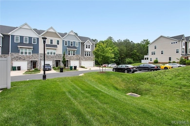 View of grassy yard with a residential view