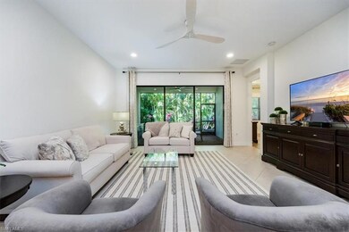 Living area with recessed lighting, ceiling fan, a