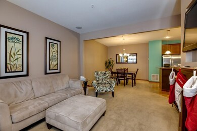 Living room with view of large dining area