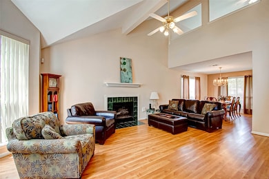 Your living room, fireplace, and formal dining. The kitchen is just to your right as is the utility room and primary suite.