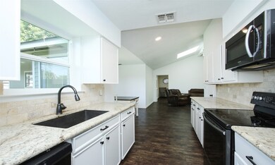 Beautifully updated Kitchen (19x8) includes:  Gran