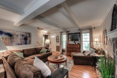 Plenty of natural light arrives courtesy of full-length windows and french doors