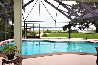 Enclosed pool overlooking Lake Gibson