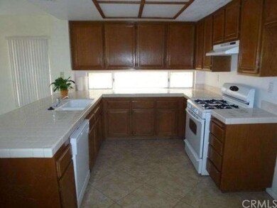 Newer, beautiful tile throughout the downstairs.