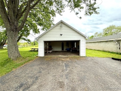 First garage opens up to the second garage