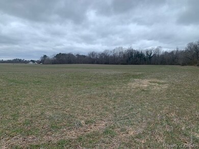 View of yard with a rural view