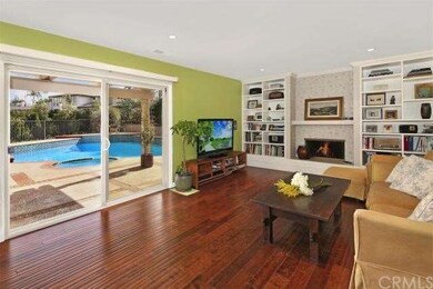 Spacious family room with fireplace and a view of 