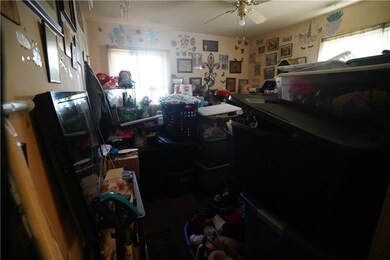 Garage featuring ceiling fan