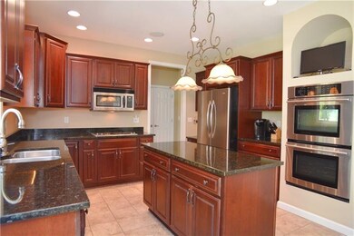 With a plethora of storage, gleaming granite count