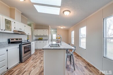 1508 Willow Downs Cir, Willow Spring, NC 27592 - photo 4