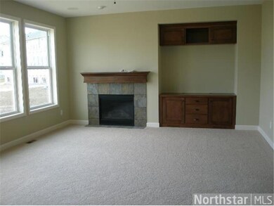 Main floor family room features gas fireplace and 