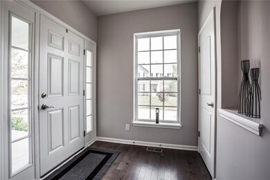 Light and bright entry. Entire home has been freshly painted in a soft grey color.