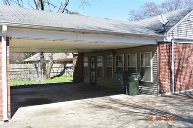 Enter through the carport door int the family room