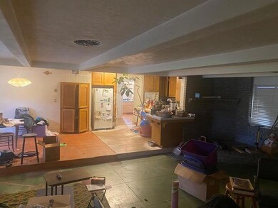 Main living area, dining area and kitchen