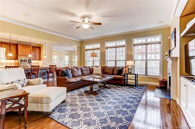 Great Room with Ceiling Fan and Wood Flooring