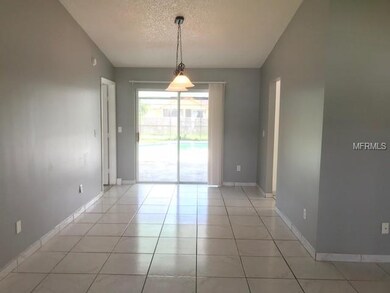 Large formal dining with slider to the screened po