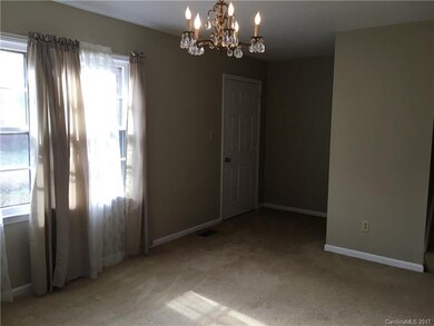 Living room and front door.