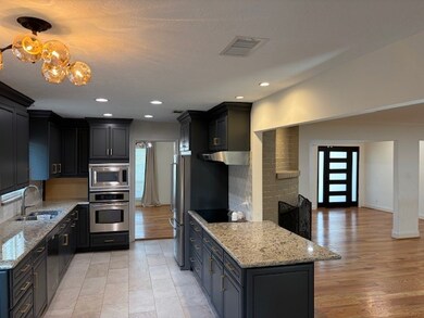 5519 Queensloch Dr, Houston, TX 77096 - photo 6