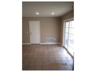 Dining Room. Watch the kids play outside while you eat in this roomy dining area off the kitchen.