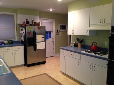 Kitchen. The large kitchen opens up to a fully fen