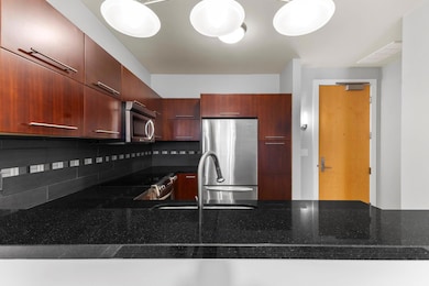 Kitchen featuring a sink, stainless steel applian