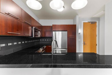Kitchen featuring a sink, stainless steel applian