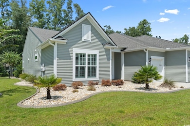 View of front of home featuring a garage and a fro