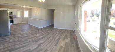 Spare room with a wealth of natural light and dark