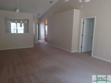 Greatroom with vaulted ceilings looking back towar