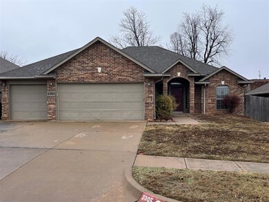 Single story home featuring a garage