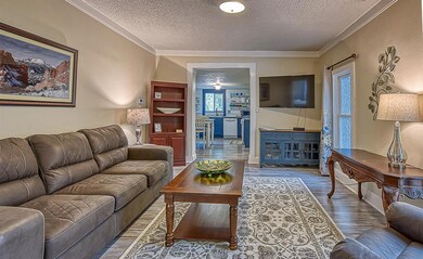 Living room looking to kitchen