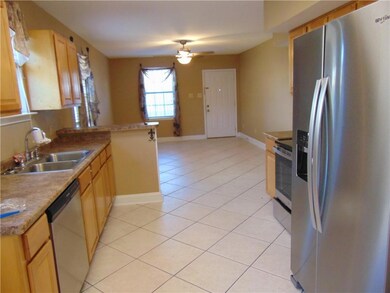 Kitchen with new refrigerator & Stove.  Kitchen al
