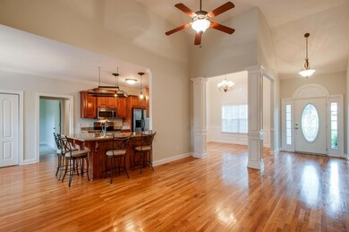 Hardwood floors are featured throughout the downstairs living space