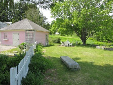 Back yard has established perennial...