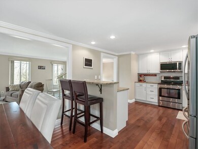 Beautifully updated kitchen with hardwood floors,