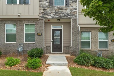 Entrance to property with board and batten siding