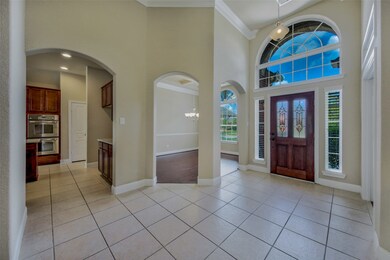 The formal dining room and study flank the entryway.